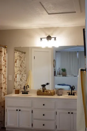 a view of kitchen with cabinets and wooden floor
