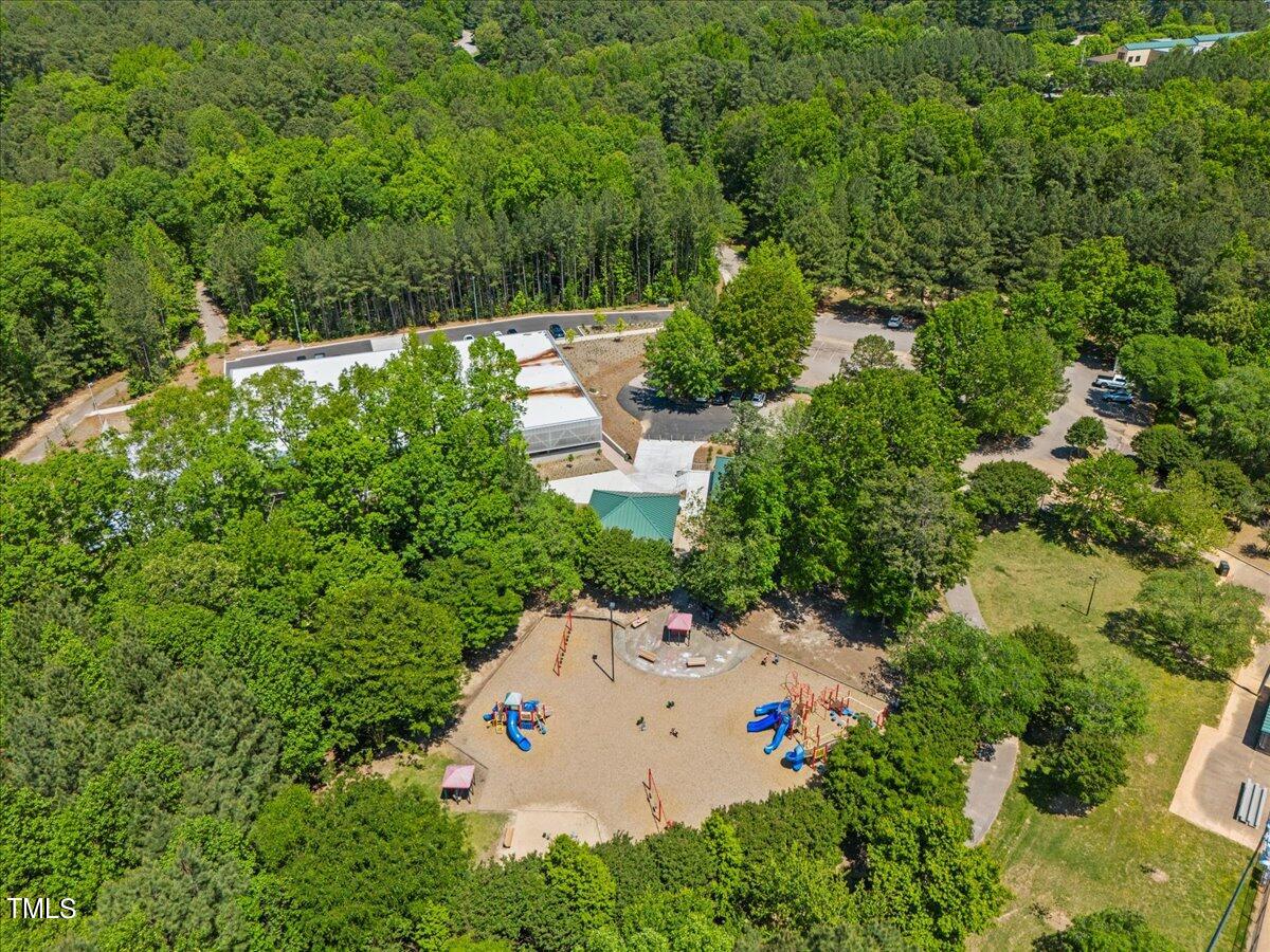 8604 Stanton Place Raleigh, NC 27615 - Photo 50 of 54 an aerial view of a house with yard and outdoor seating