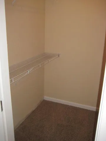 a view of small space with racks on the wall