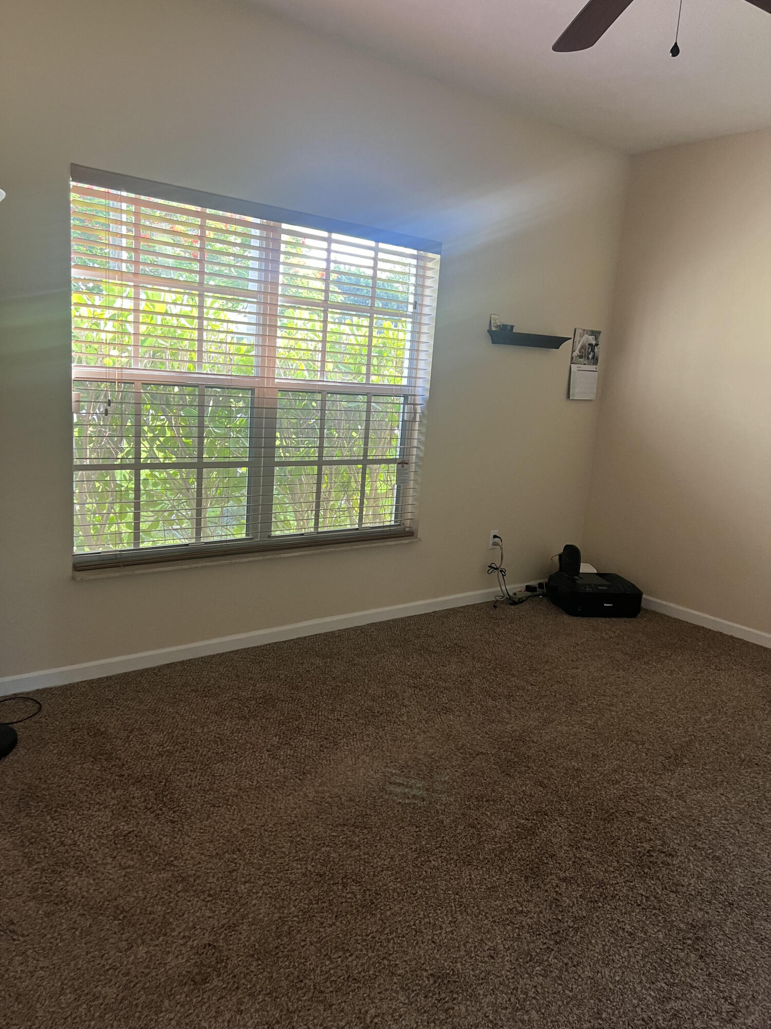 944 Southeast Browning Avenue Port St. Lucie, FL 34983 - Photo 13 of 18 a view of an empty room with a window