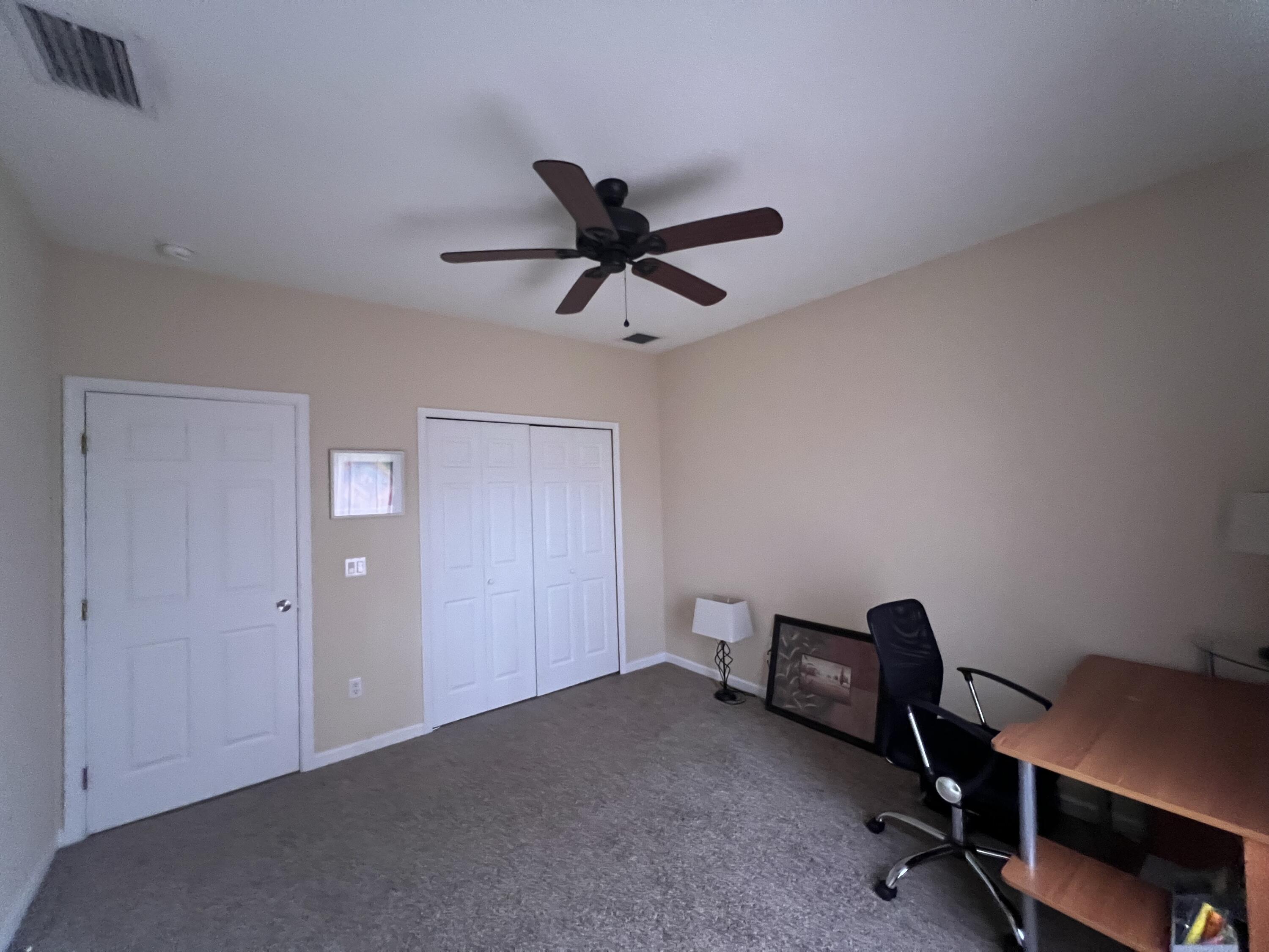 944 Southeast Browning Avenue Port St. Lucie, FL 34983 - Photo 8 of 18 a view of workspace with a window