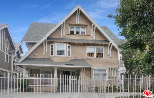 a front view of house with a yard