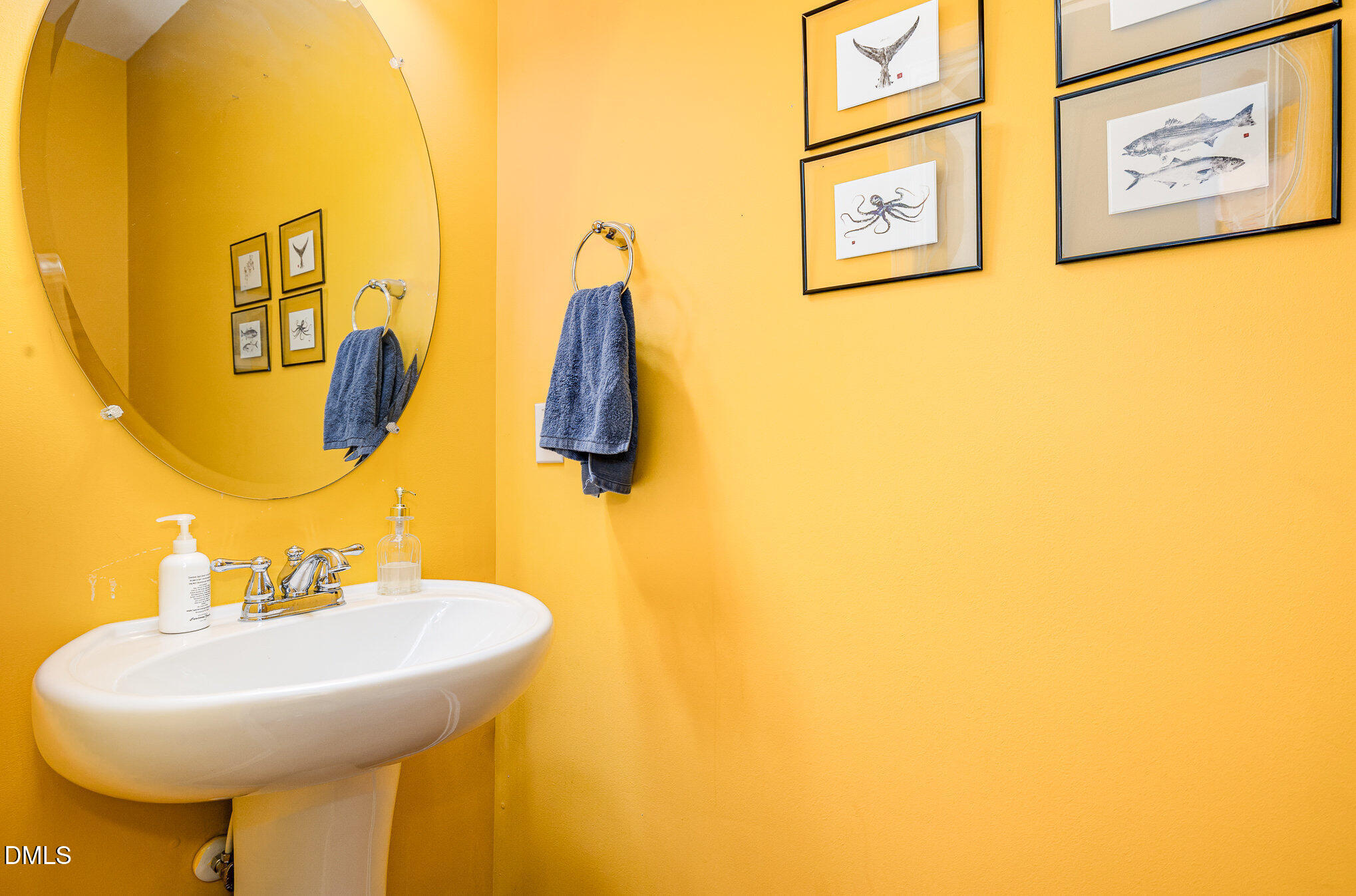 513 Dragby Lane Raleigh, NC 27603 - Photo 12 of 30 a bathroom with a sink and a mirror