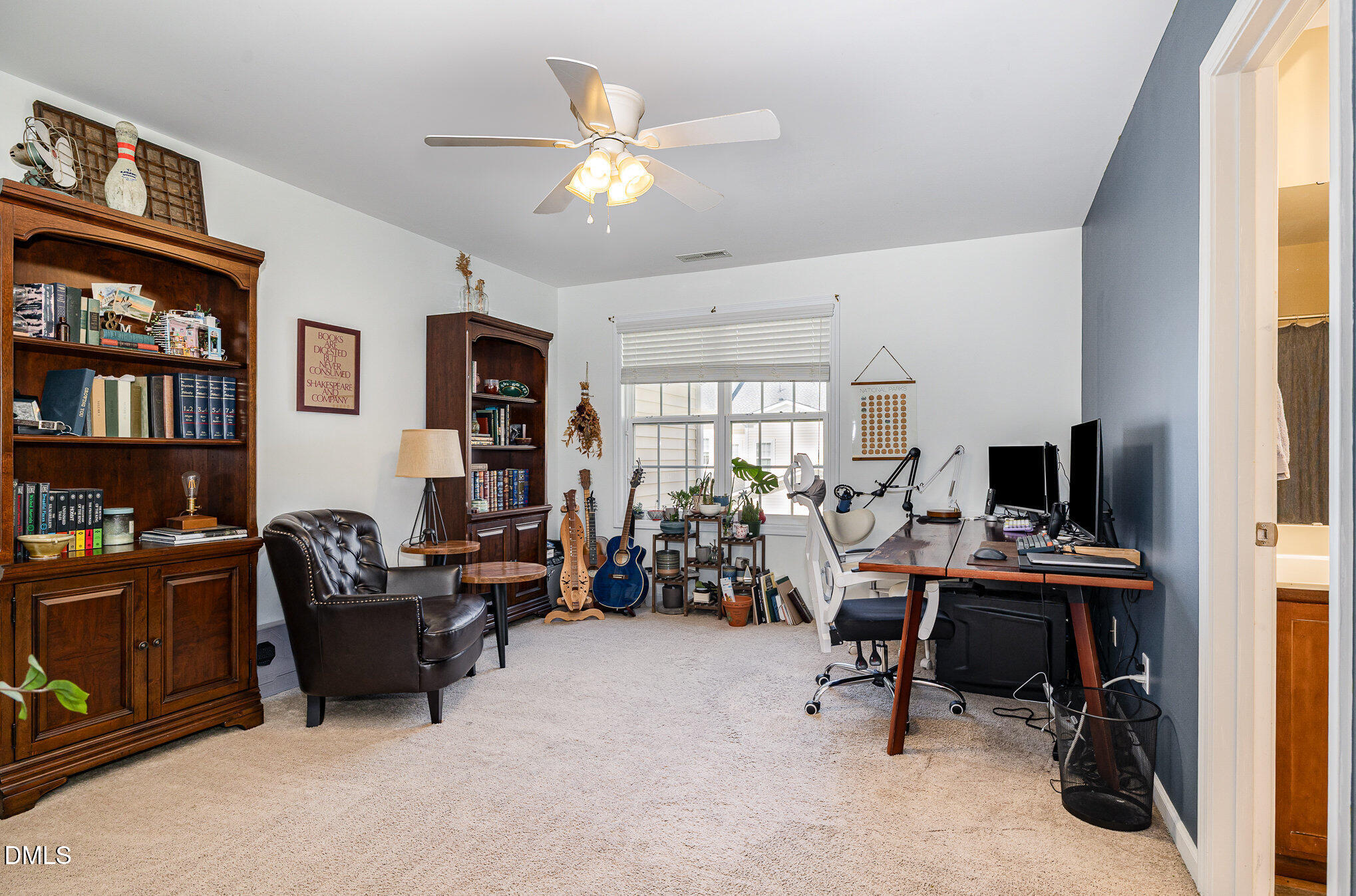 513 Dragby Lane Raleigh, NC 27603 - Photo 19 of 30 a view of a workspace with furniture and a window