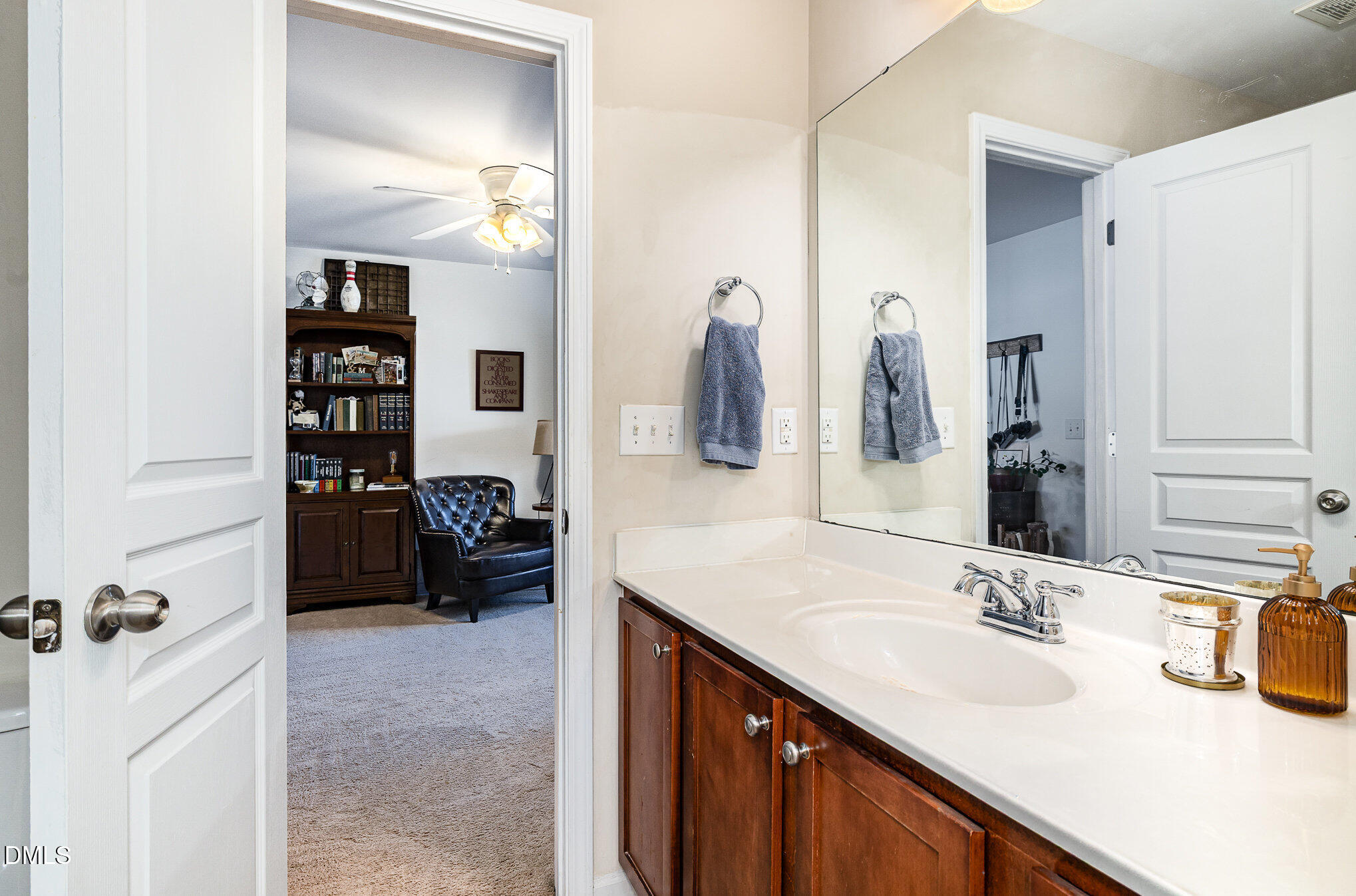 513 Dragby Lane Raleigh, NC 27603 - Photo 23 of 30 a en suite bathroom with a sink double vanity and a mirror