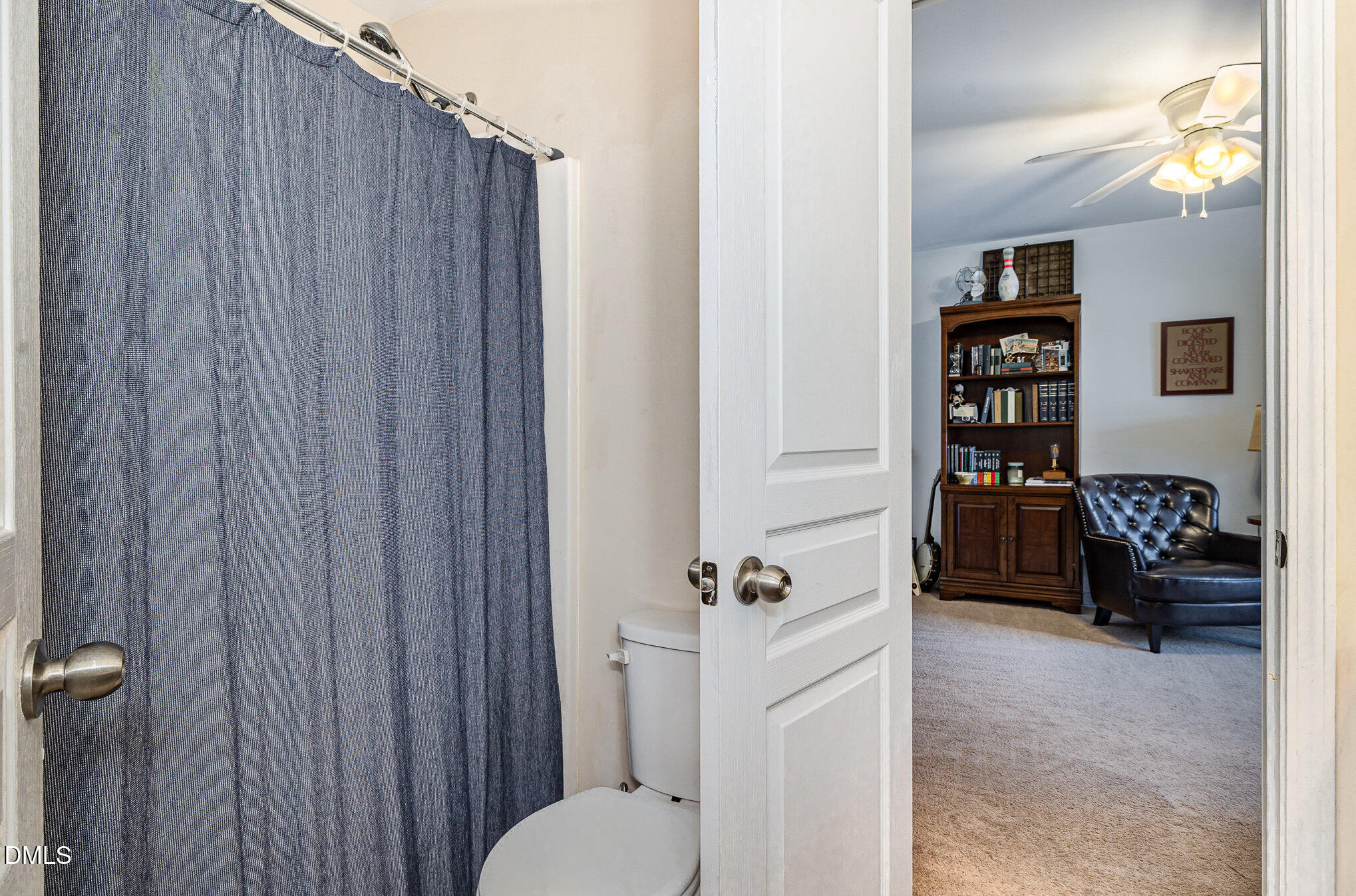 513 Dragby Lane Raleigh, NC 27603 - Photo 24 of 30 a bathroom with a toilet and a shower