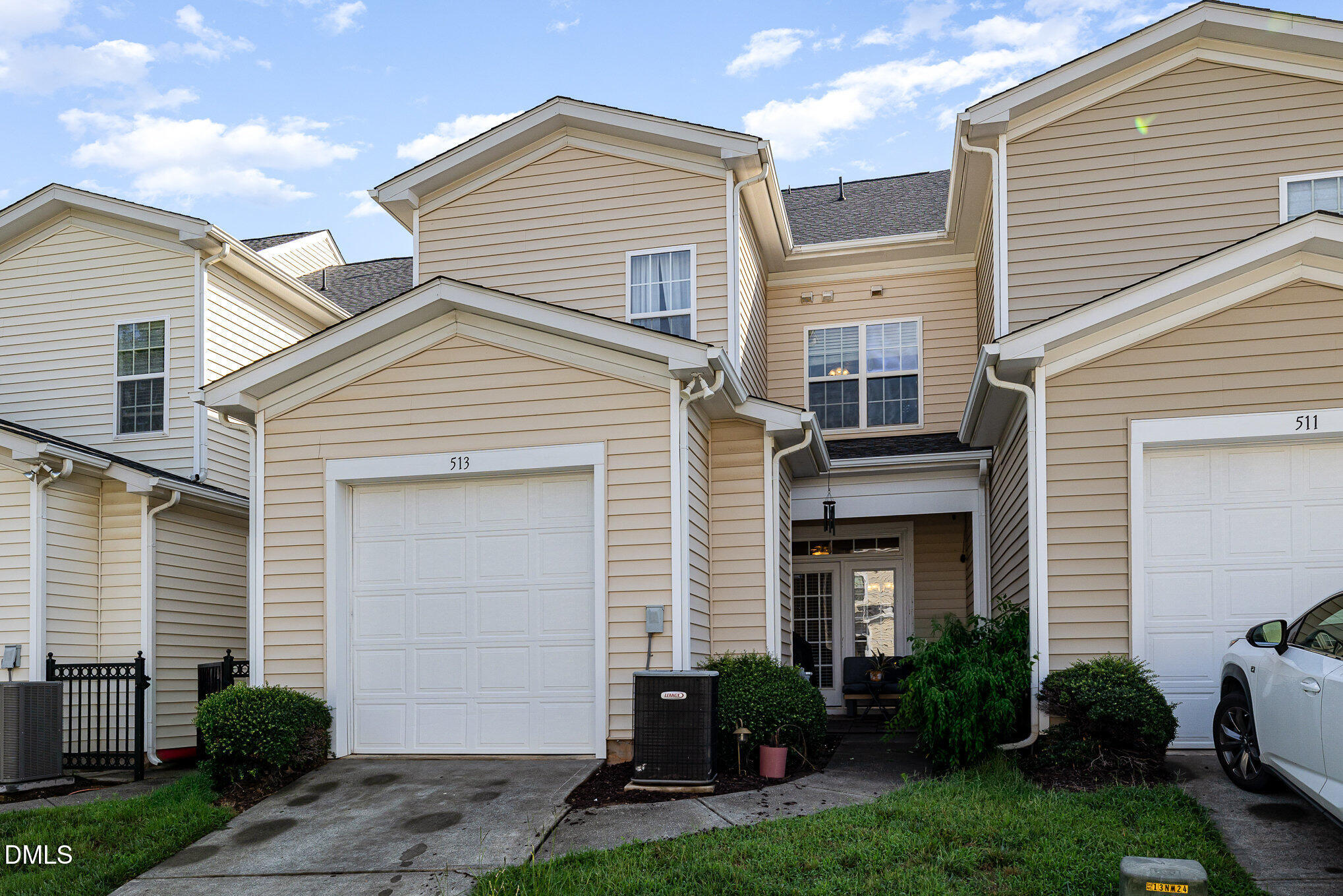 513 Dragby Lane Raleigh, NC 27603 - Photo 26 of 30 a front view of a house with garden