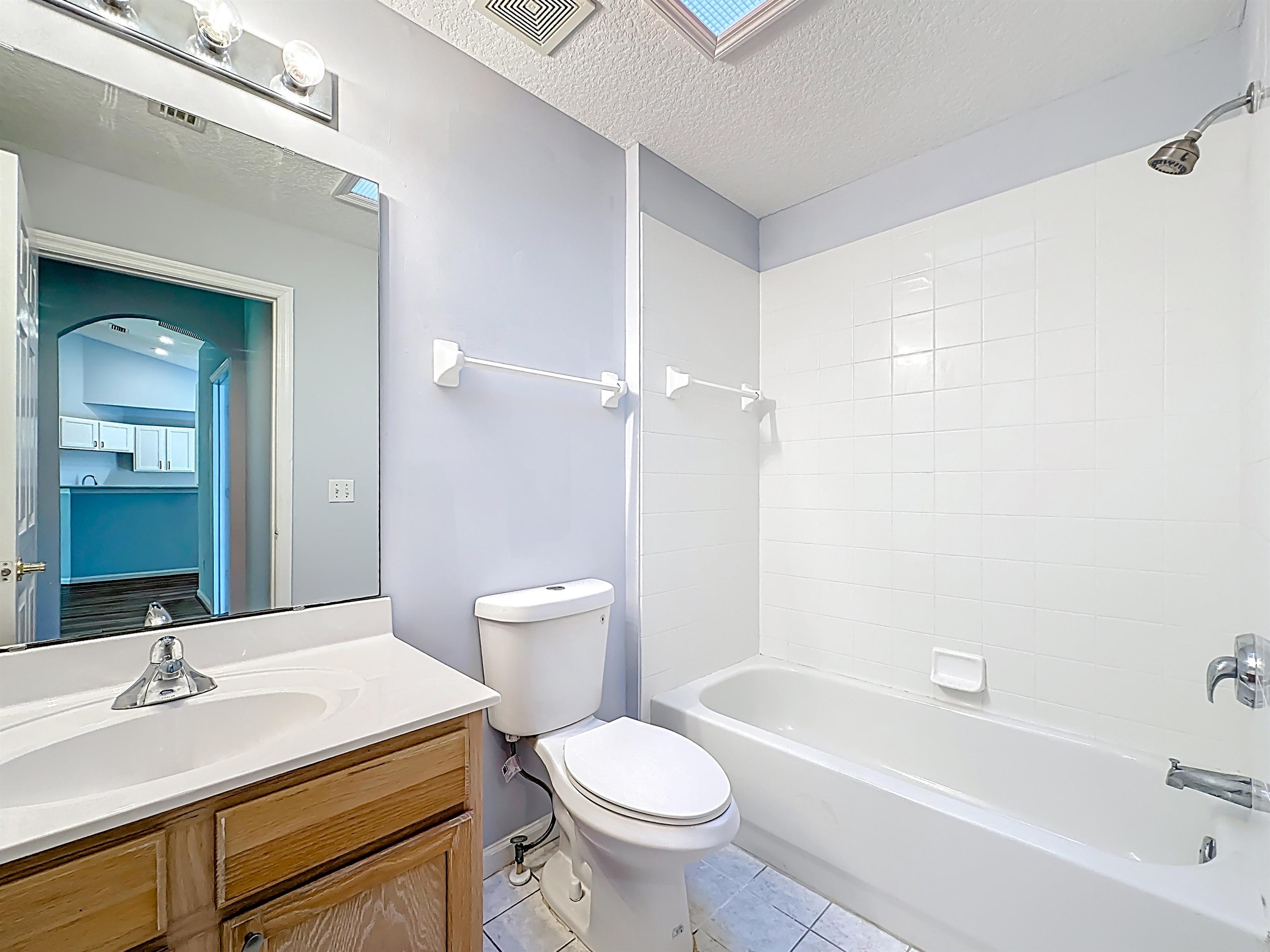 200 Merida Road St. Augustine, FL 32086 - Photo 37 of 66 a bathroom with a sink toilet vanity and shower