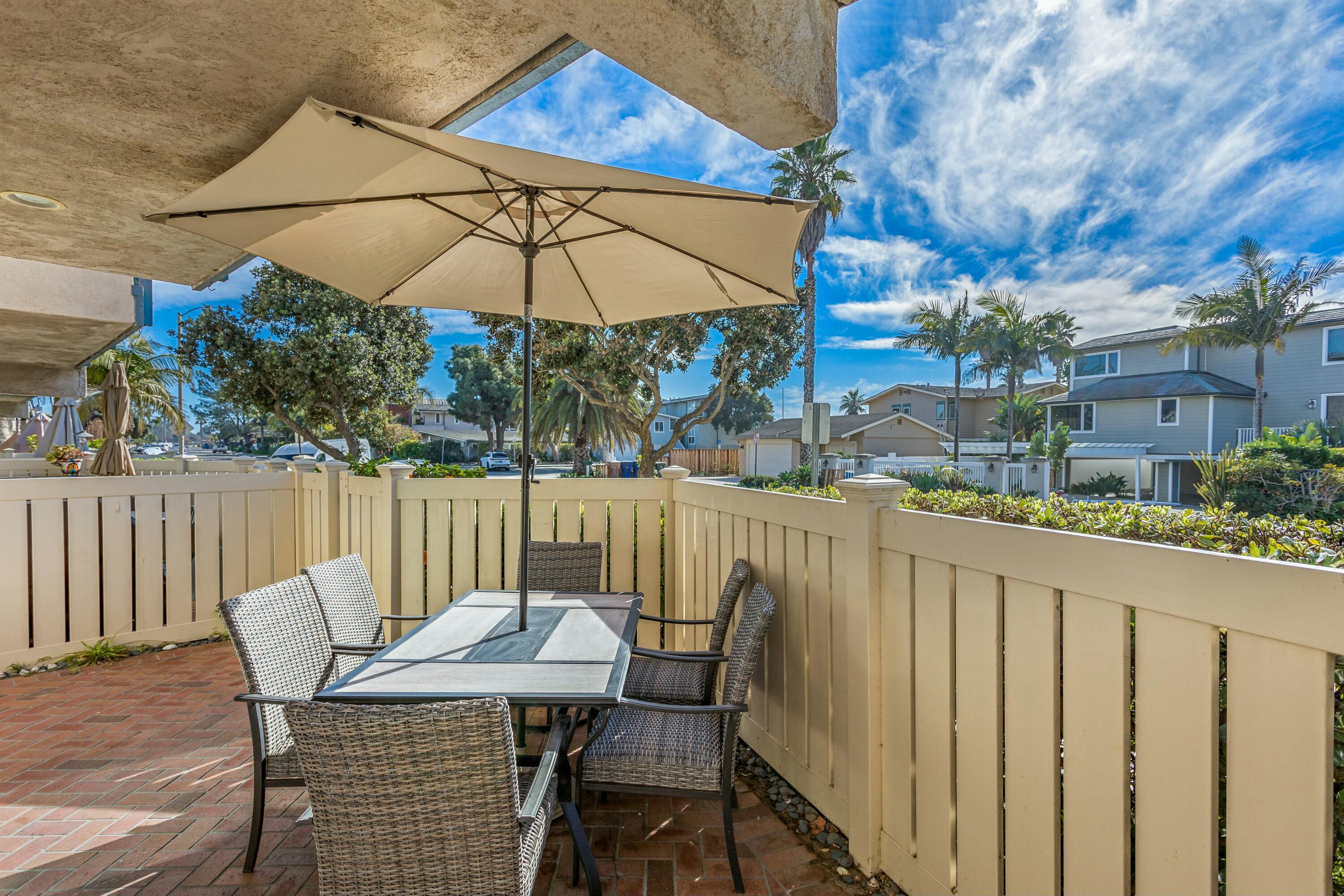 4700 Sandyland Road, Unit 12 Carpinteria, CA 93013 - Photo 15 of 27 a view of deck with furniture and umbrella