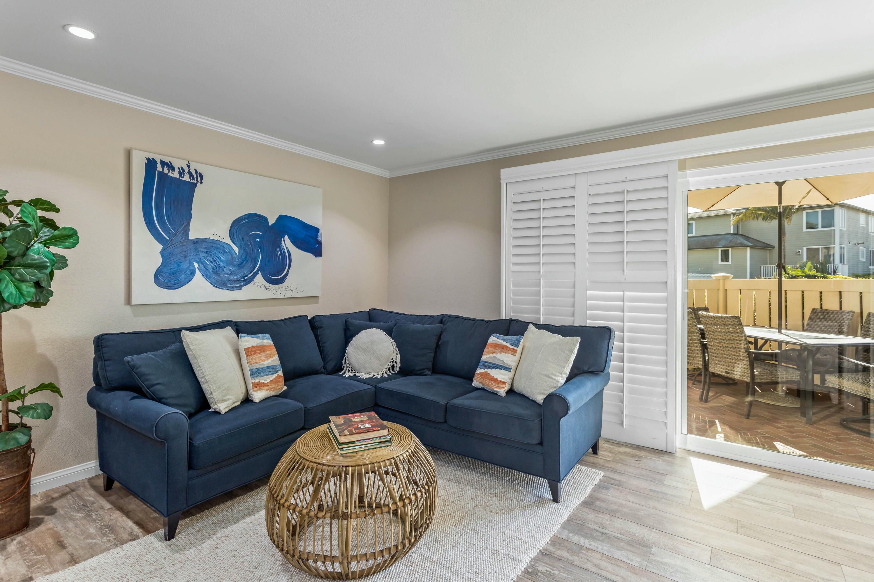 4700 Sandyland Road, Unit 12 Carpinteria, CA 93013 - Photo 4 of 27 a living room with furniture and a large window