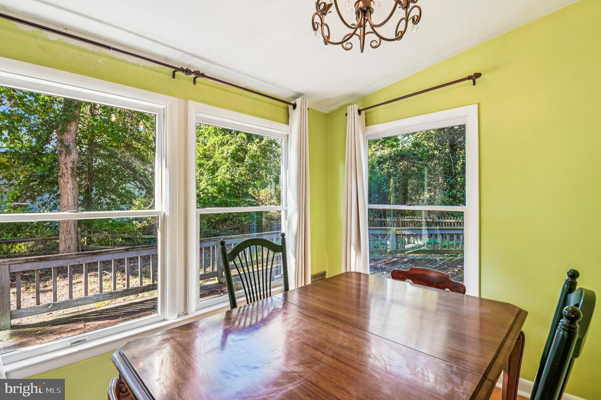 575 6th Street Pasadena, MD 21122 - Photo 12 of 38 Windows in dining room give views to back yard