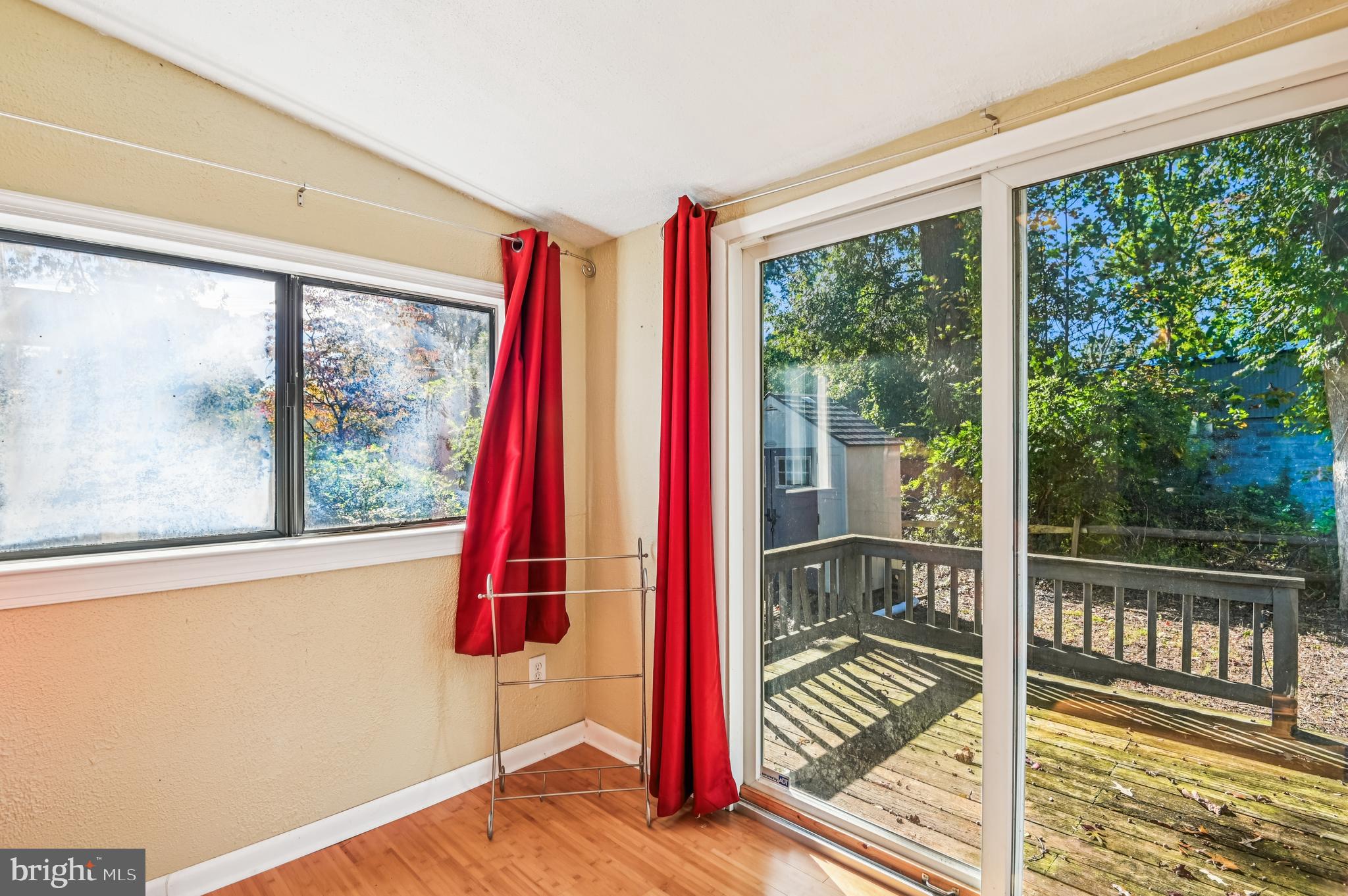 575 6th Street Pasadena, MD 21122 - Photo 18 of 38 Access to deck from primary bedroom