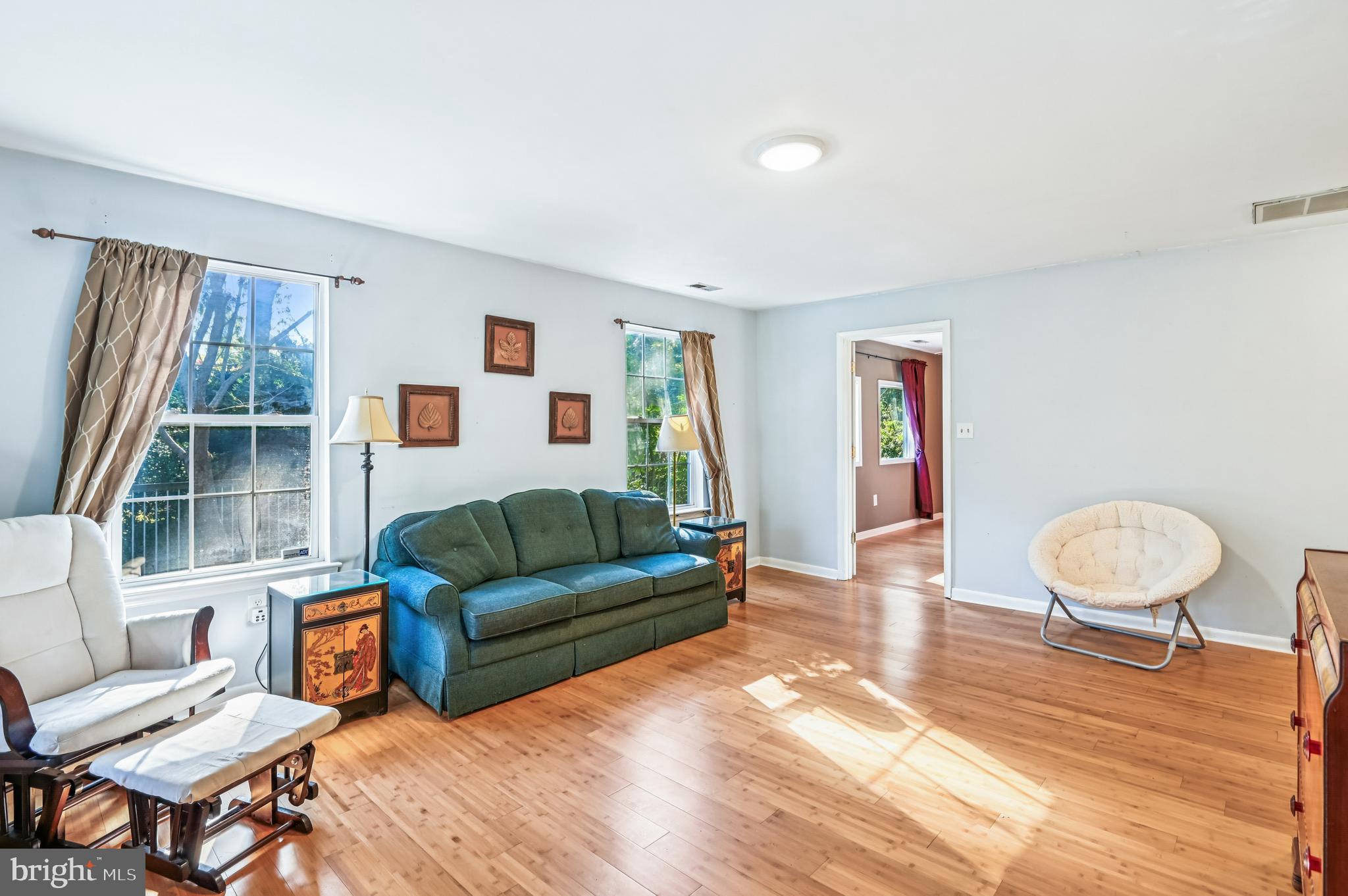 575 6th Street Pasadena, MD 21122 - Photo 4 of 38 Multiple windows with natural lighting