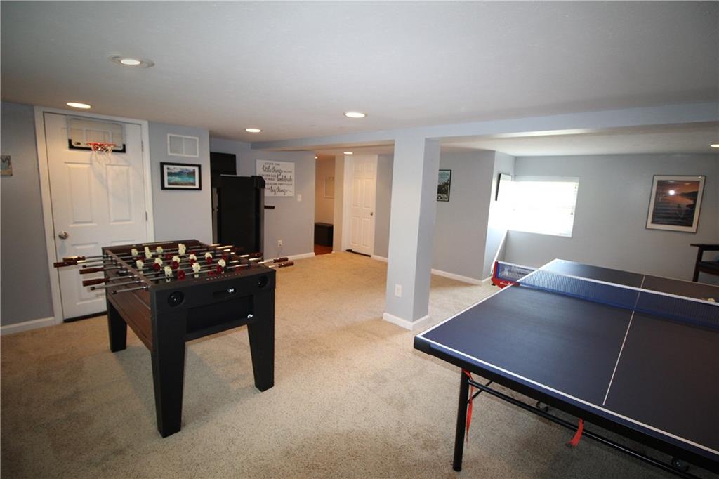 310 Fort Couch Road Pittsburgh, PA 15241 - Photo 20 of 25 Recessed lights and windows give this room plenty of light.