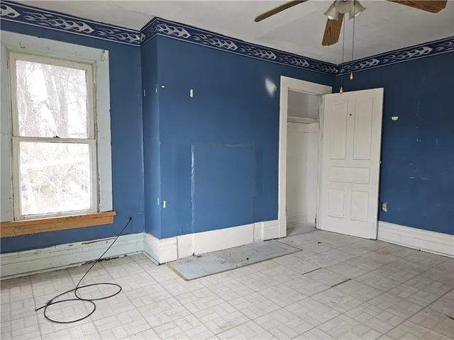 an empty room with windows