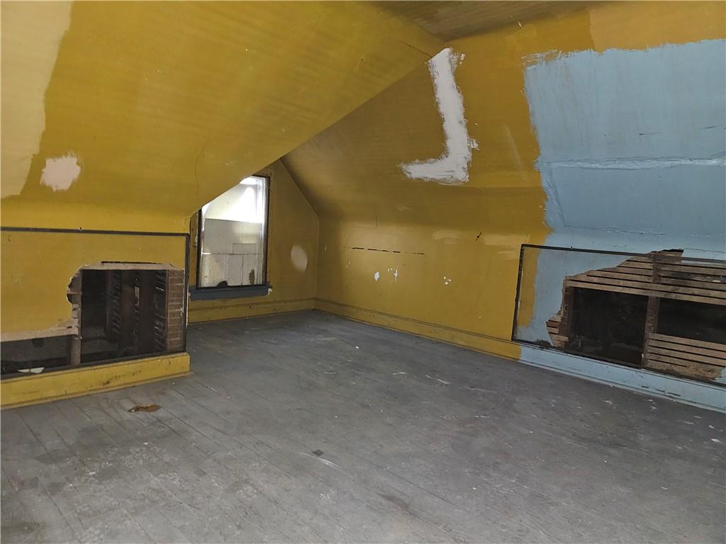 1101 Market Street Beaver, PA 15009 - Photo 19 of 21 a view of a livingroom with fireplace