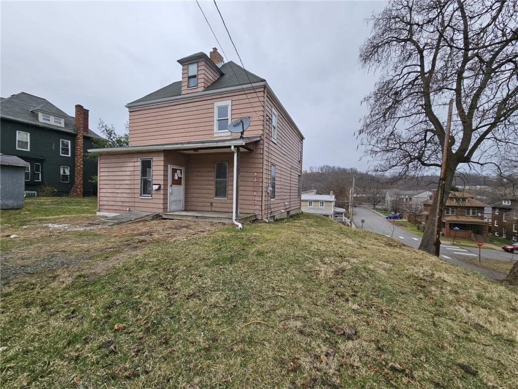1101 Market Street Beaver, PA 15009 - Photo 21 of 21 a view of a house with a yard