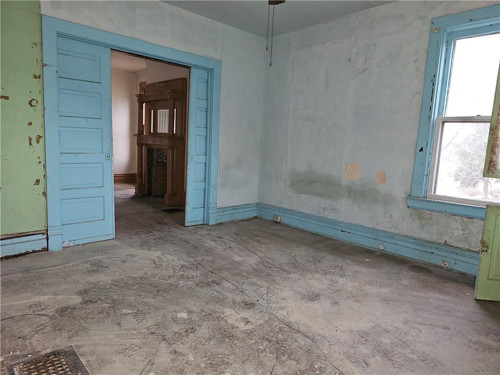1101 Market Street Beaver, PA 15009 - Photo 7 of 21 an empty room with windows and closet