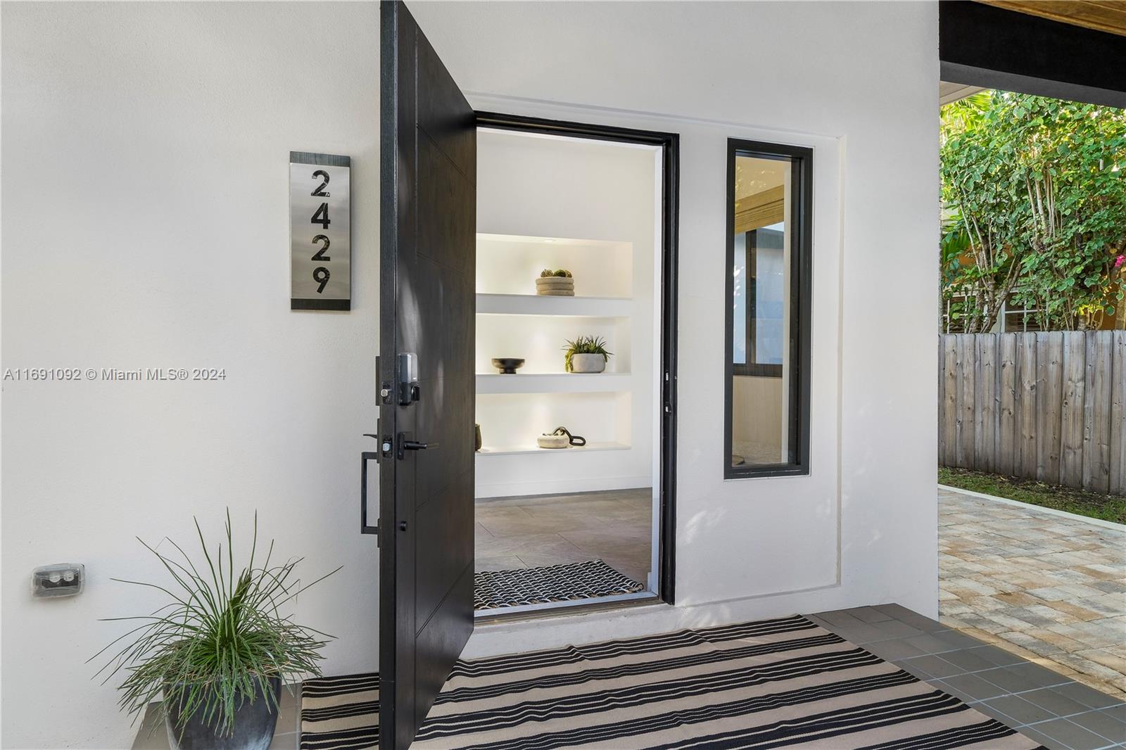 2429 Southwest 25th Terrace Miami, FL 33133 - Photo 5 of 35 a view of a entryway door of the house