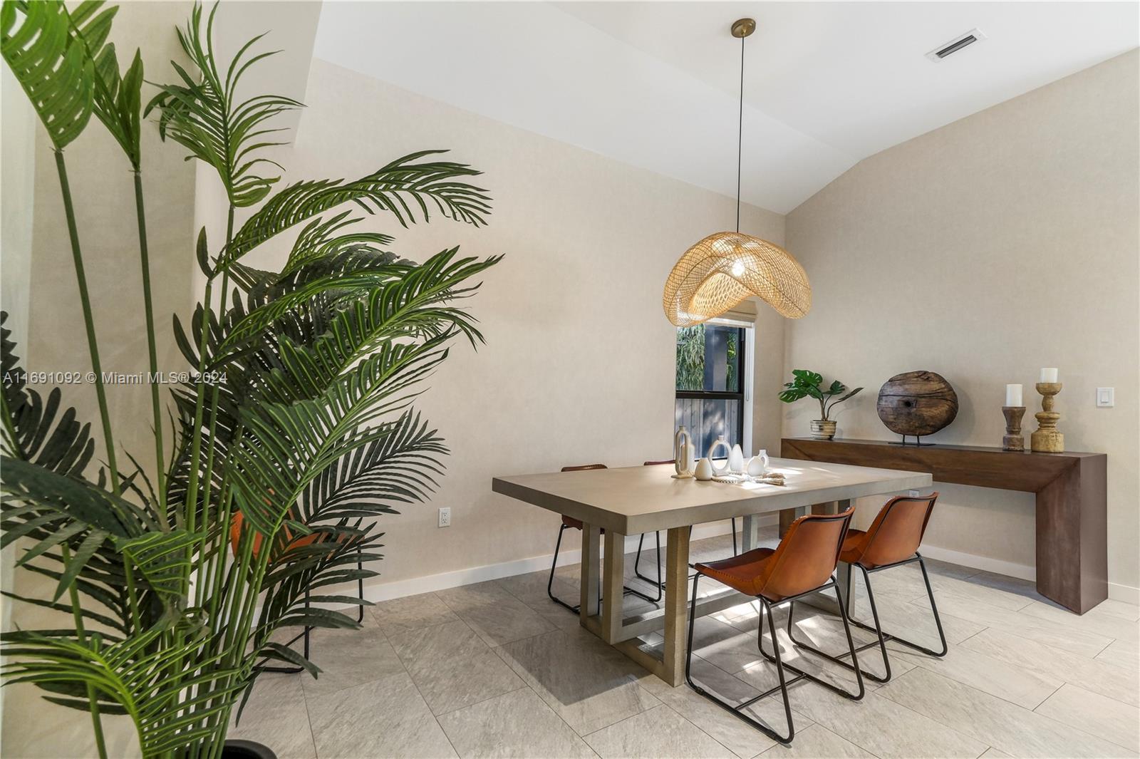 2429 Southwest 25th Terrace Miami, FL 33133 - Photo 10 of 35 a dining room with furniture and window