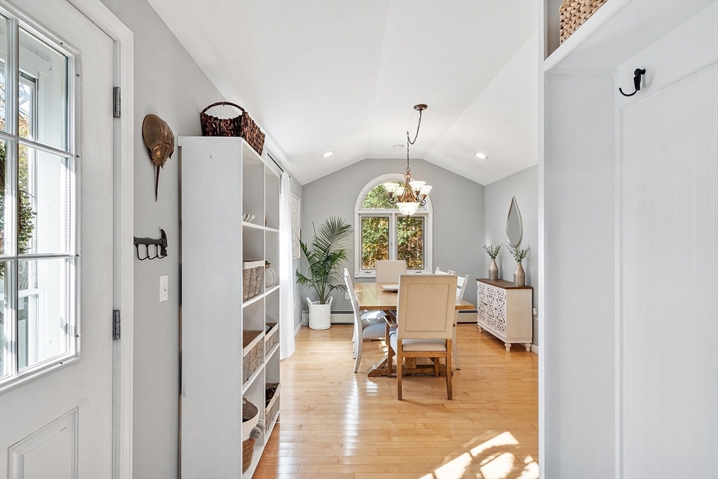 66 Dawson Road Worcester, MA 01602 - Photo 11 of 40 a view of a livingroom with furniture wooden floor and a chandelier
