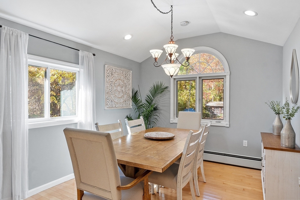 66 Dawson Road Worcester, MA 01602 - Photo 13 of 40 a dining room with furniture a potted plant and a chandelier