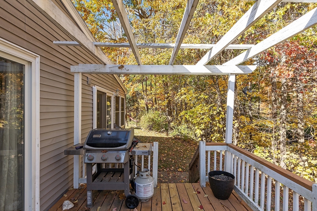 66 Dawson Road Worcester, MA 01602 - Photo 38 of 40 a view of a chair and table in the balcony