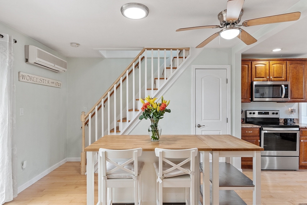 66 Dawson Road Worcester, MA 01602 - Photo 9 of 40 a view of a kitchen with furniture and stainless steel appliances