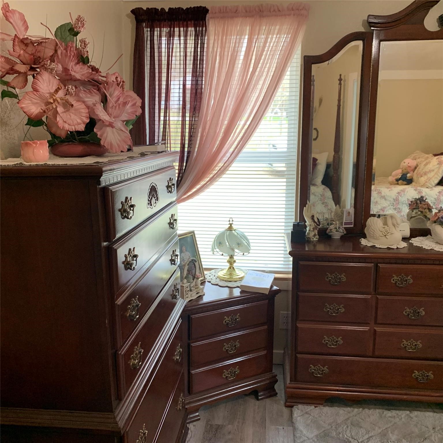 480 Sportsman Drive Trinity, TX 75862 - Photo 16 of 33 a room with a mirror cabinets and furniture