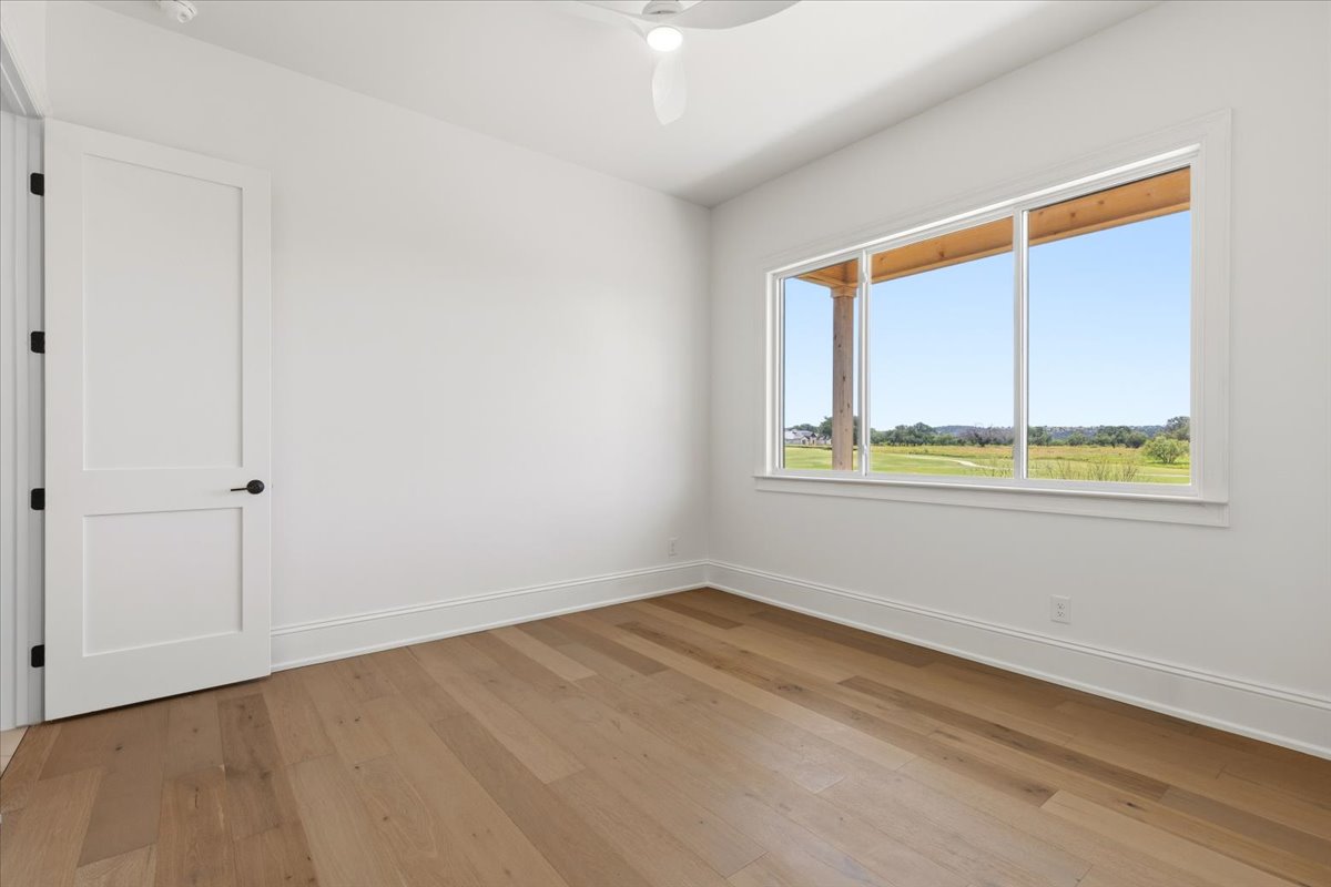 224 Sandia Loop Kingsland, TX 78639 - Photo 22 of 32 a view of an empty room with a window