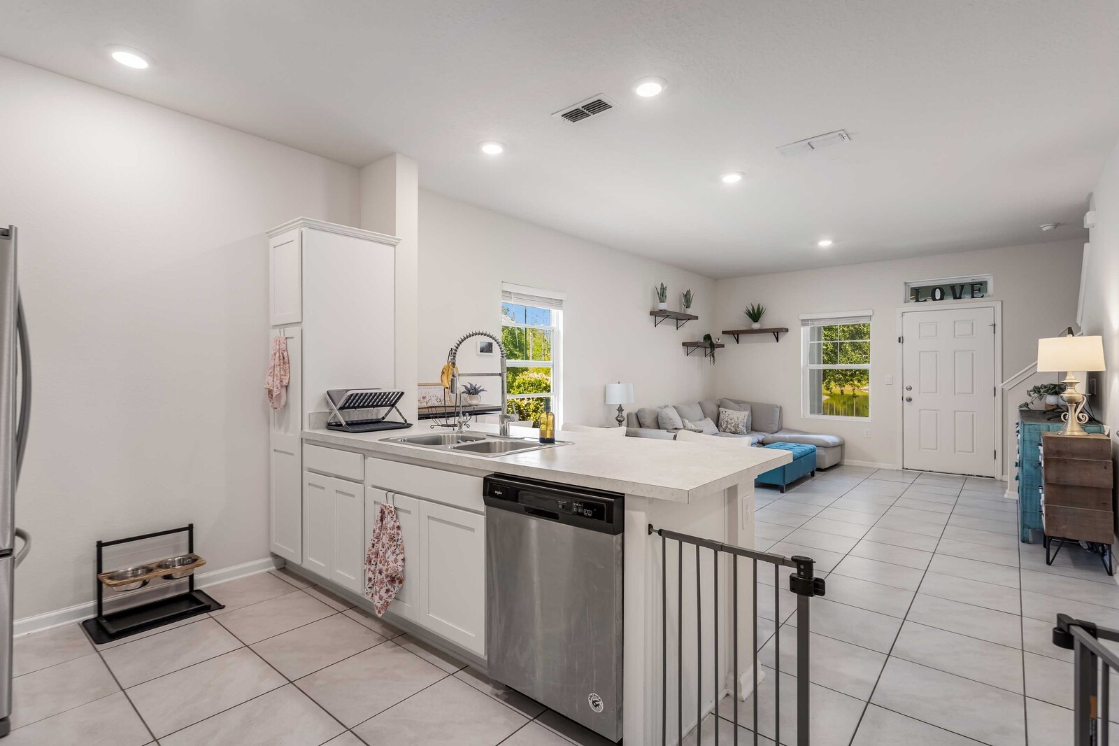 86784 Mainline Road Yulee, FL 32097 - Photo 2 of 25 a kitchen with a sink stove and cabinets