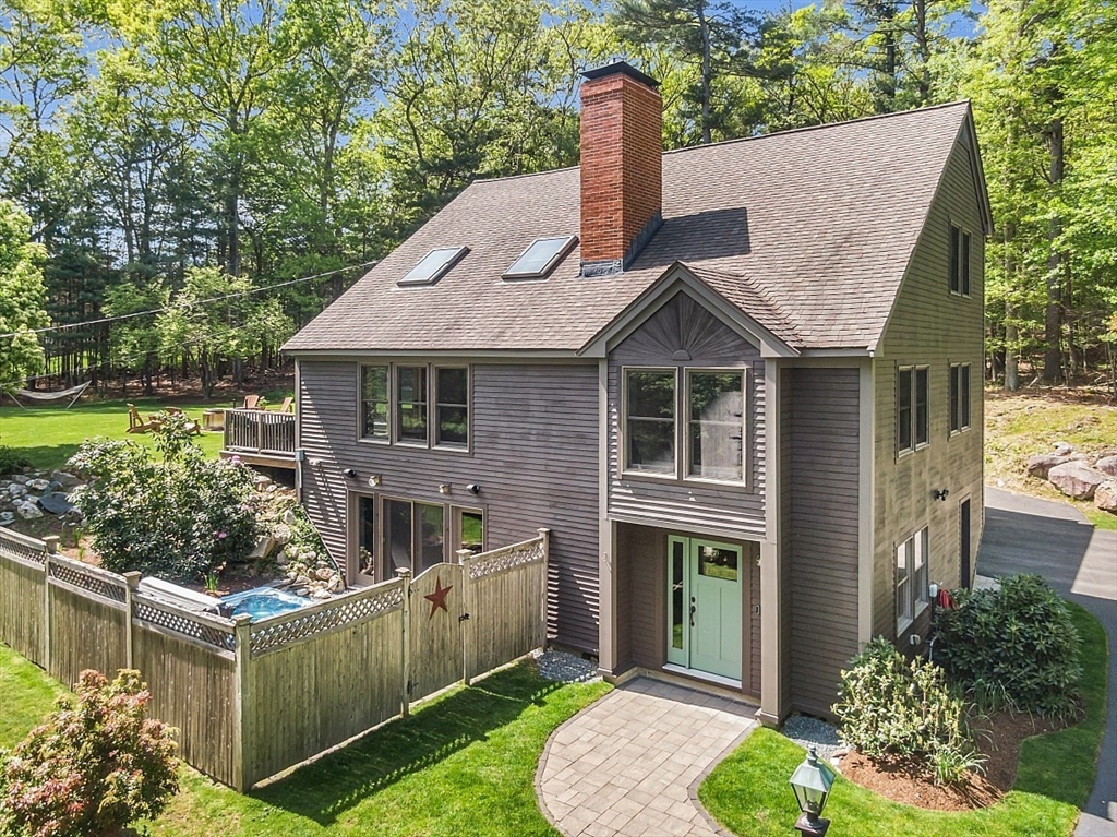 a house view with a garden space