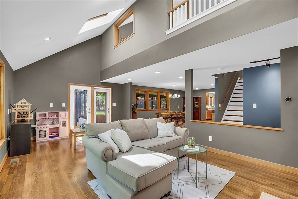 3 Valley Road North Reading, MA 01864 - Photo 12 of 42 a living room with furniture and wooden floor