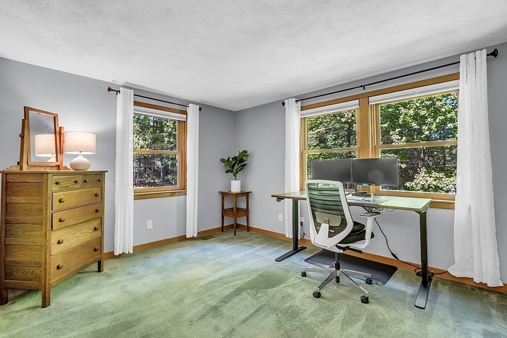 3 Valley Road North Reading, MA 01864 - Photo 14 of 42 a view of a workspace with furniture and a window