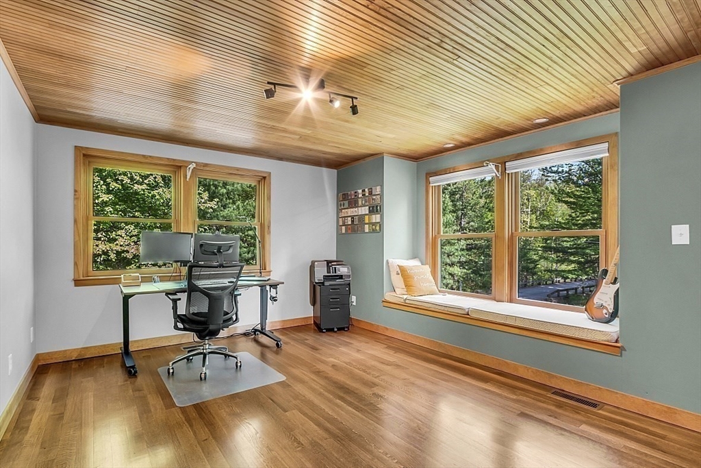 3 Valley Road North Reading, MA 01864 - Photo 15 of 42 a view of a workspace with furniture and a window