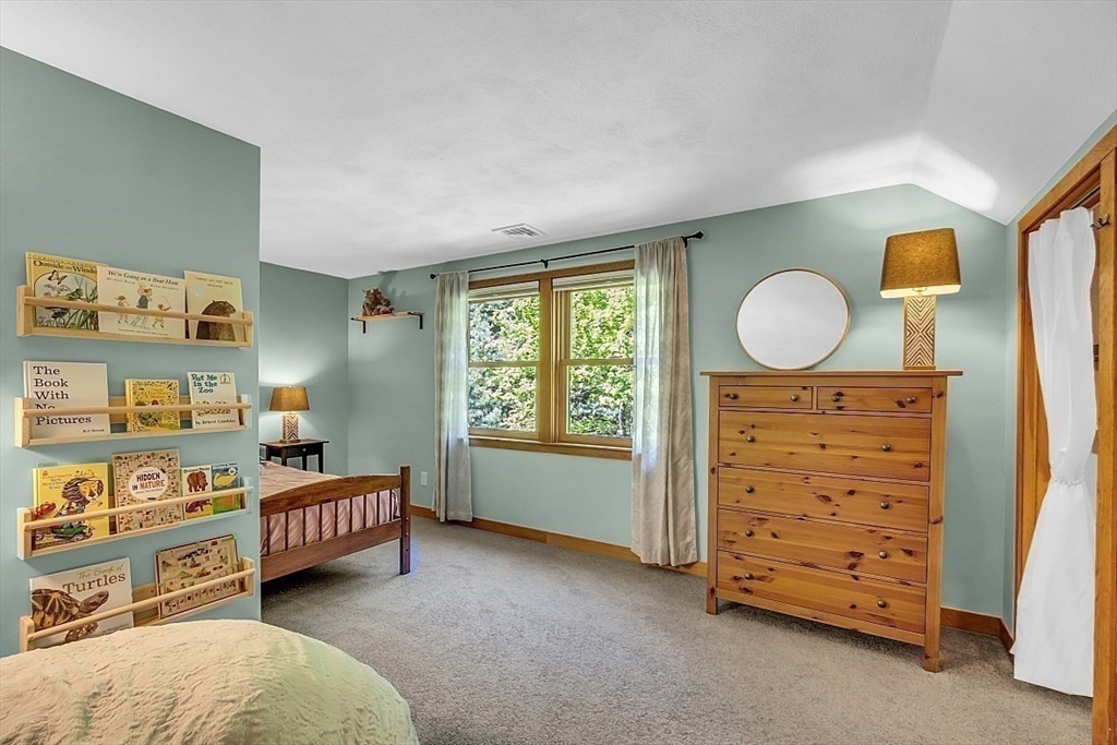 3 Valley Road North Reading, MA 01864 - Photo 25 of 42 a bedroom with a bed and a cabinets