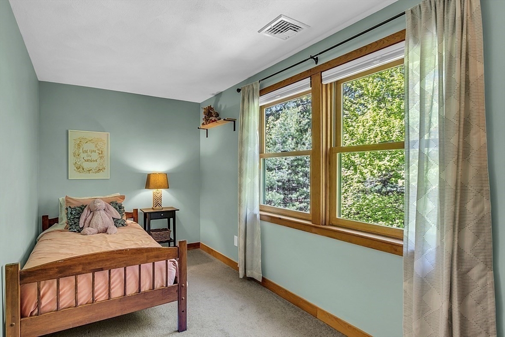 3 Valley Road North Reading, MA 01864 - Photo 26 of 42 a bedroom with a bed and window