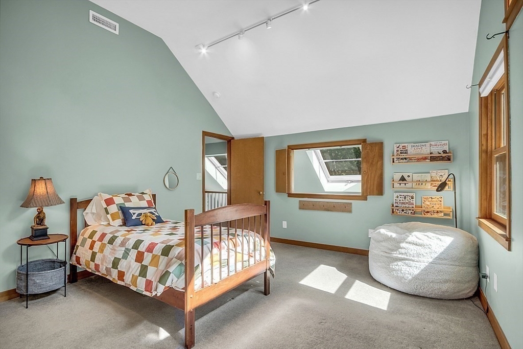 3 Valley Road North Reading, MA 01864 - Photo 28 of 42 a bedroom with a bed and window
