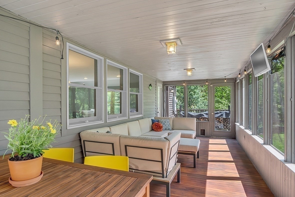 3 Valley Road North Reading, MA 01864 - Photo 31 of 42 a living room filled with furniture hardwood floor and a potted plant