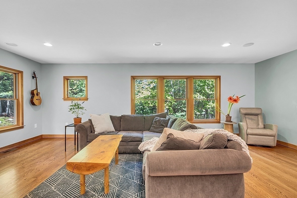 3 Valley Road North Reading, MA 01864 - Photo 9 of 42 a living room with furniture and a large window