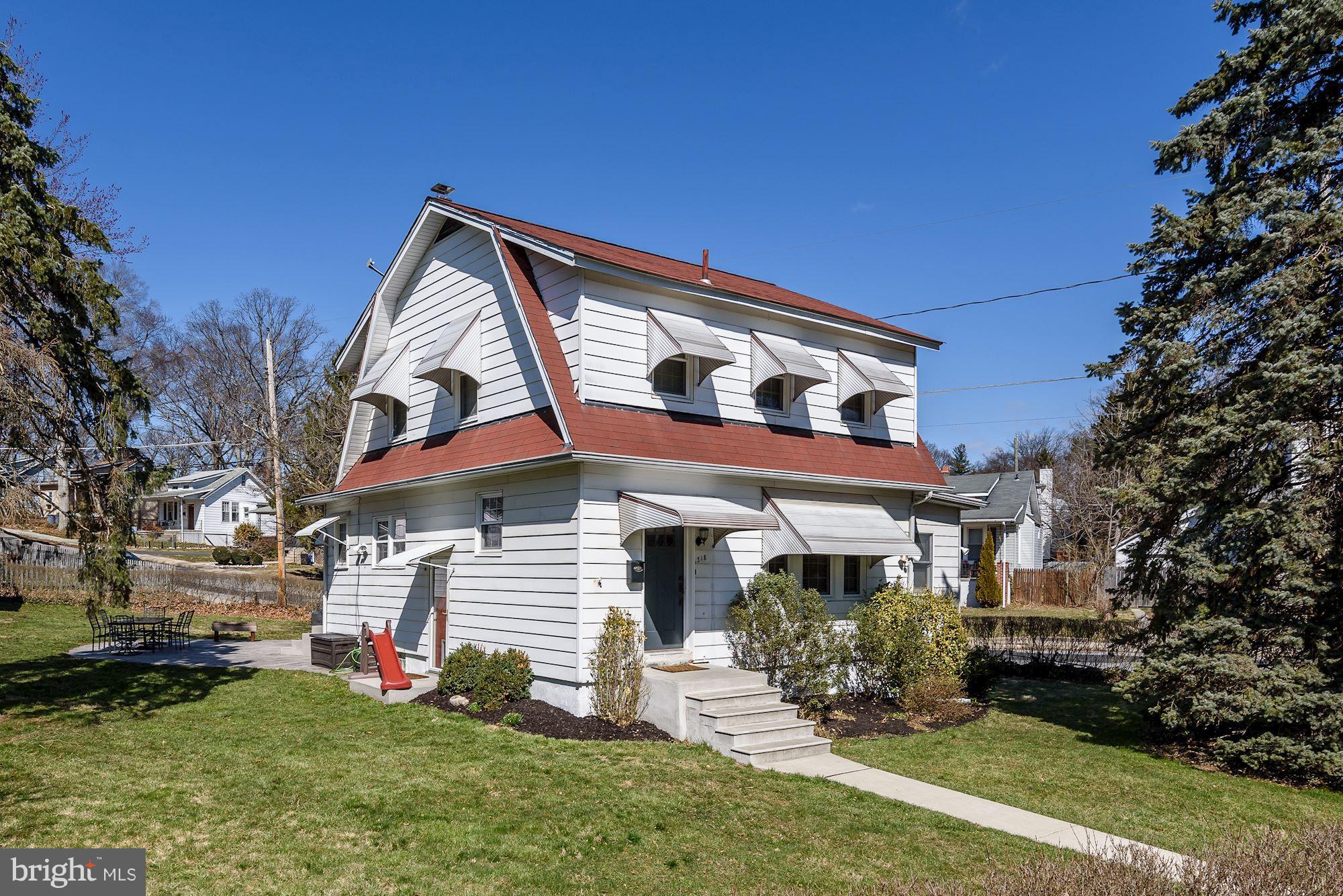 6318 Banbury Road Baltimore, MD 21212 - Photo 1 of 30 a front view of a house with a yard