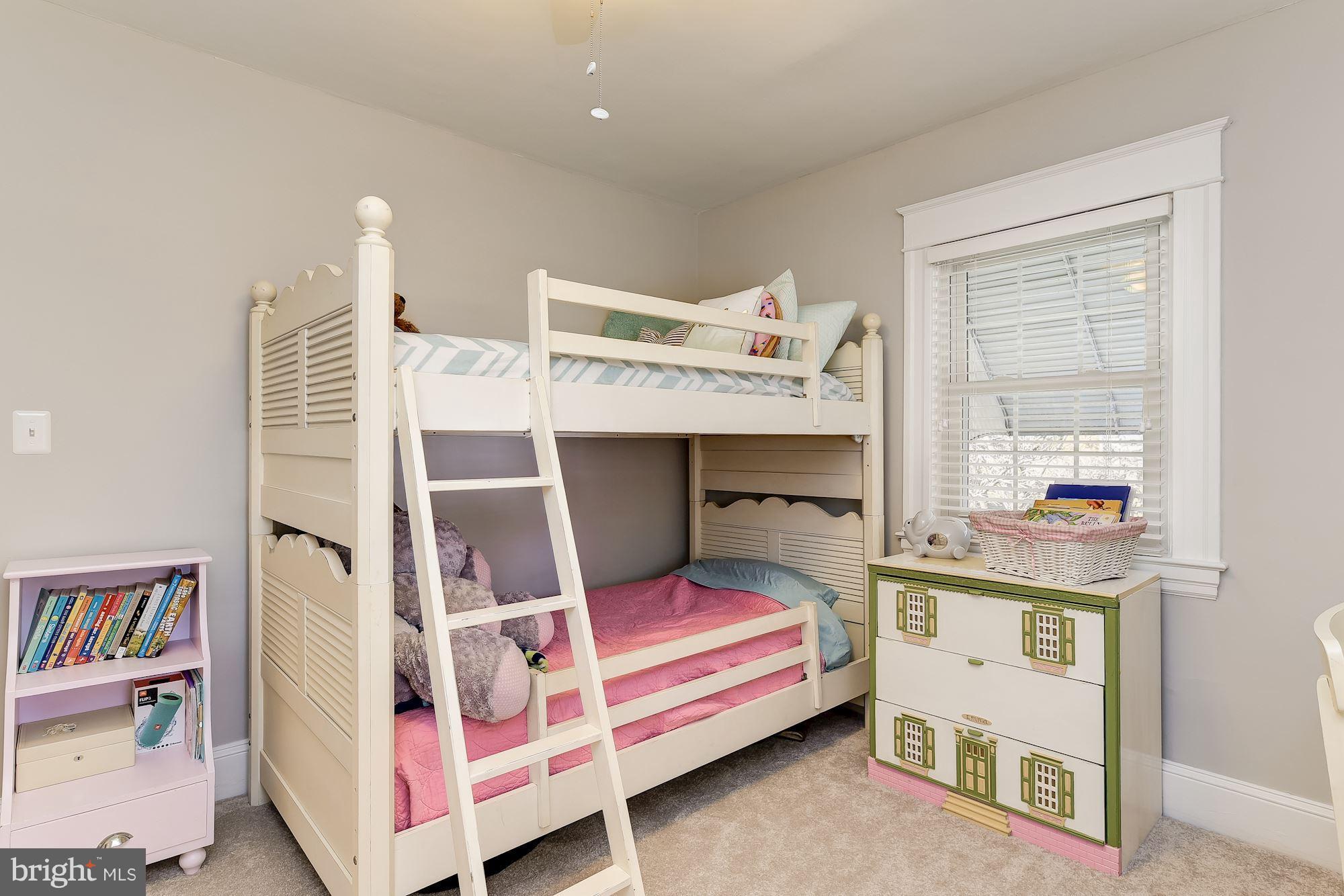 6318 Banbury Road Baltimore, MD 21212 - Photo 20 of 30 a bedroom with a bed and a window