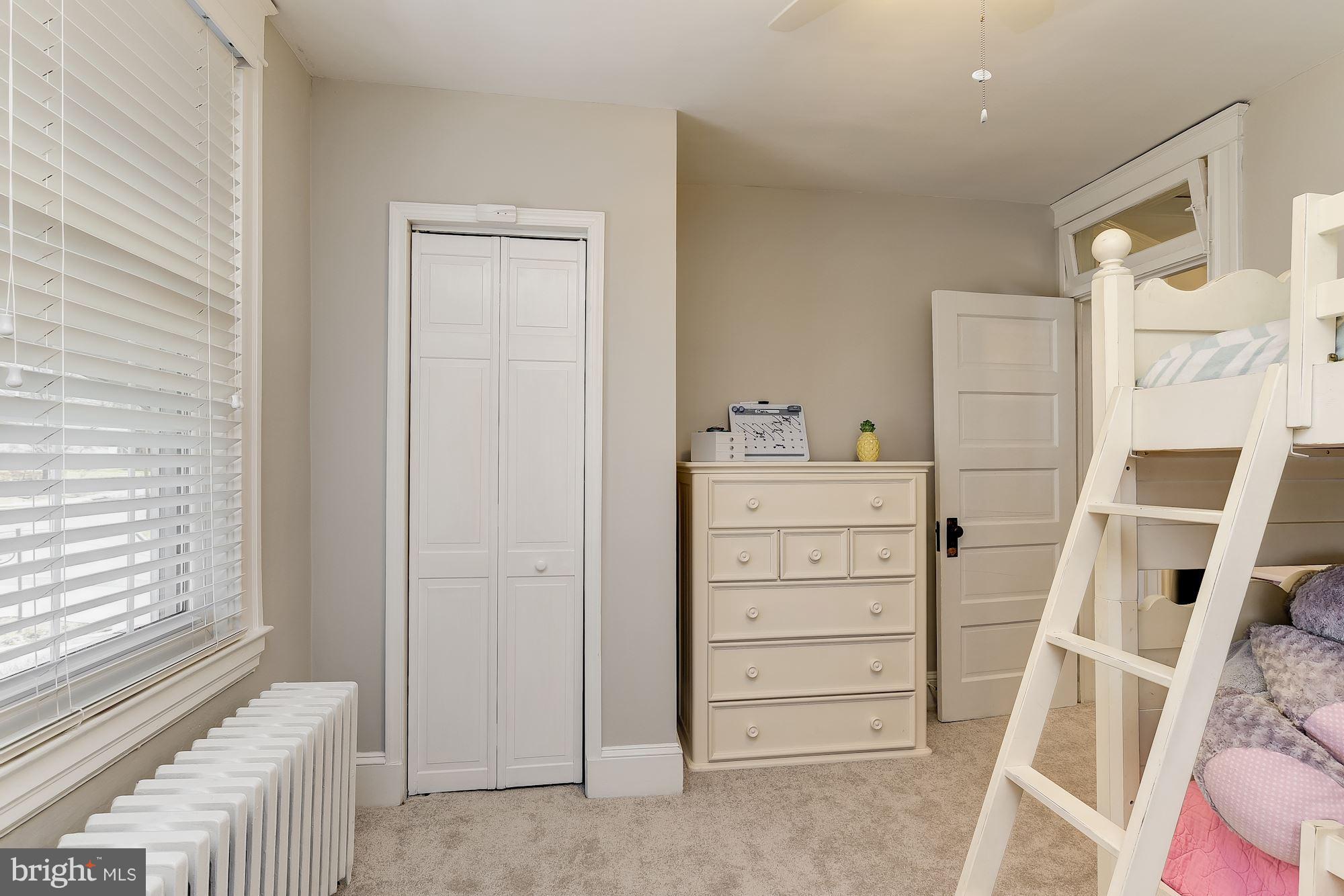 6318 Banbury Road Baltimore, MD 21212 - Photo 21 of 30 a view of walk in closet with clothes