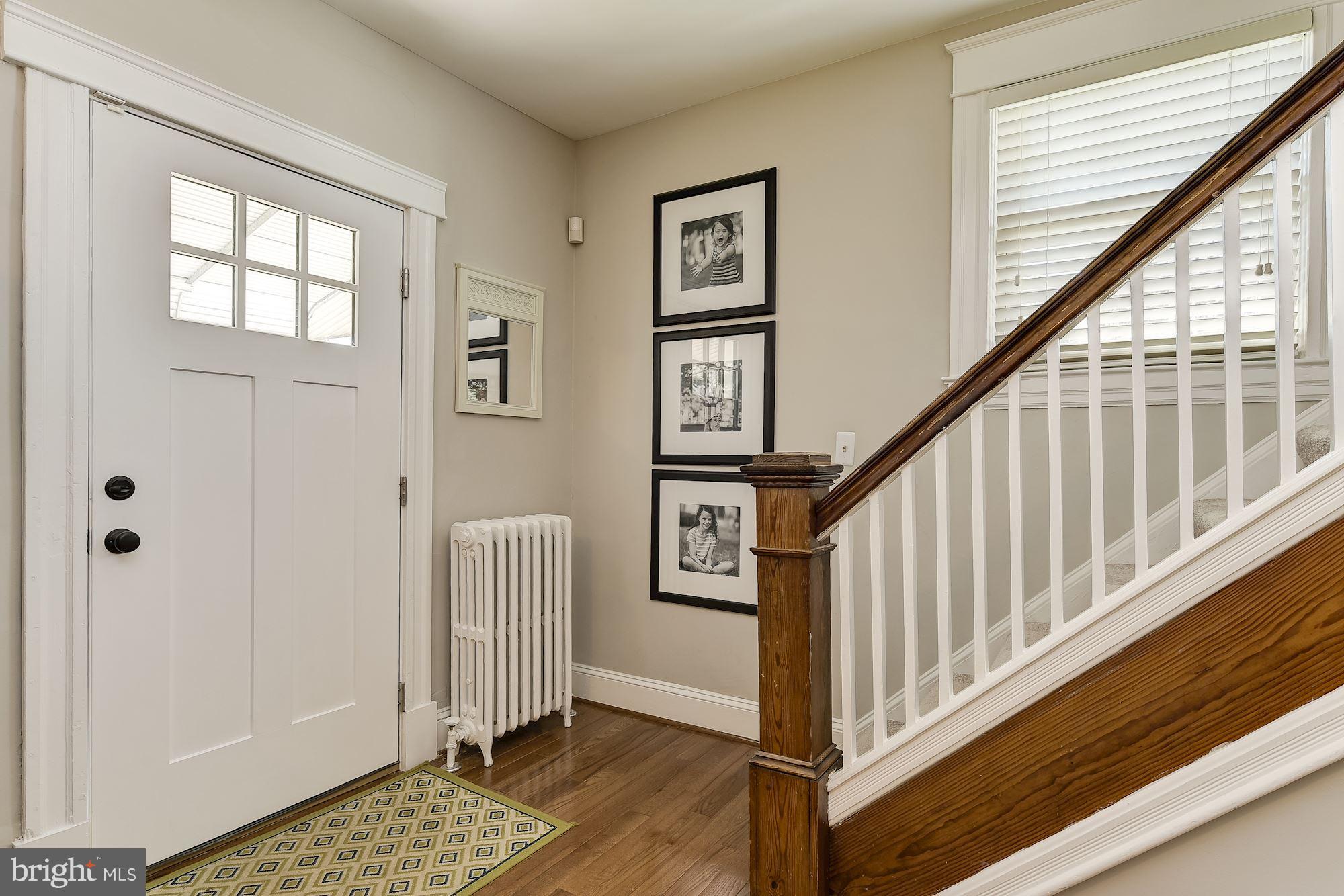 6318 Banbury Road Baltimore, MD 21212 - Photo 4 of 30 a view of an entryway with wooden floor and stairs
