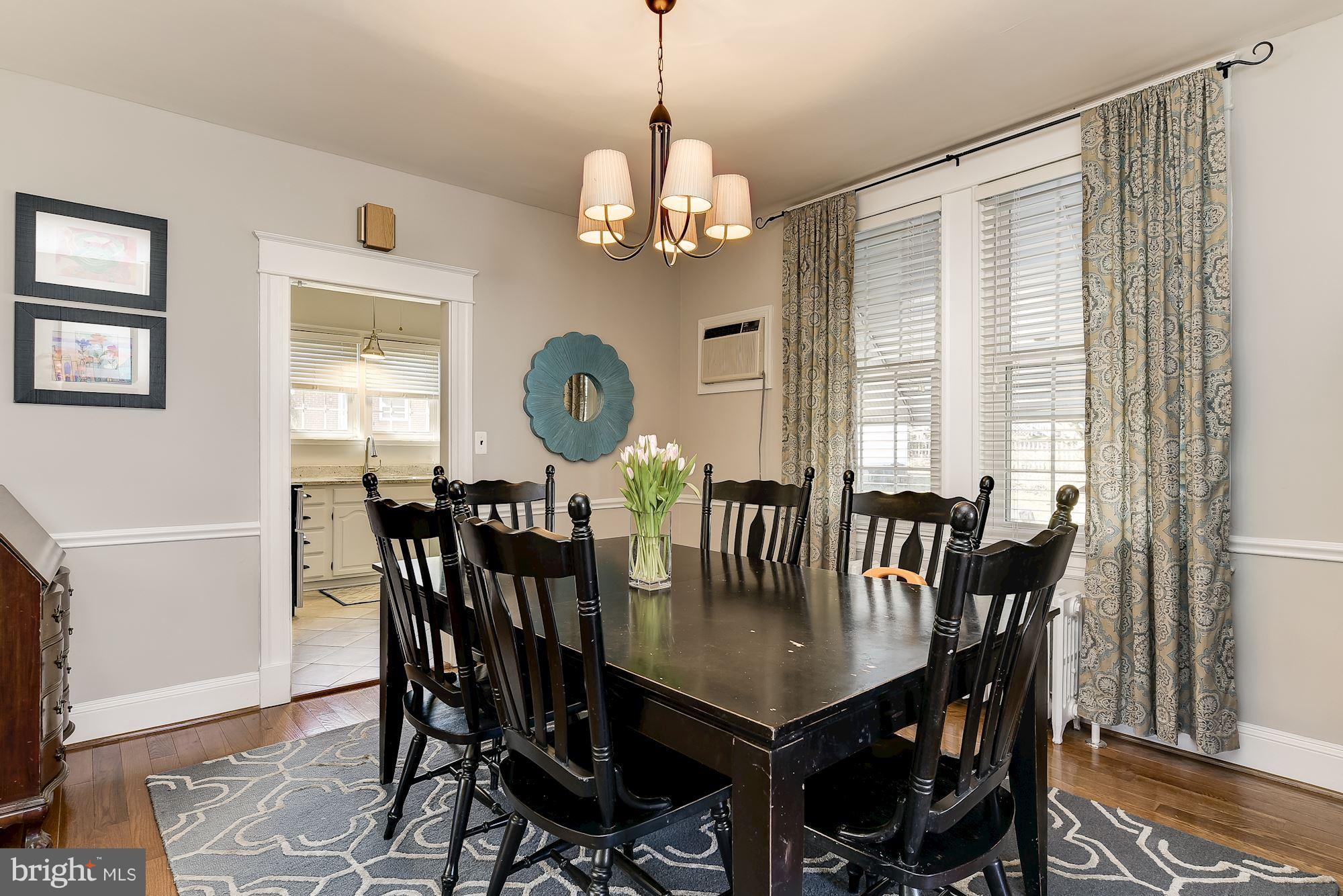 6318 Banbury Road Baltimore, MD 21212 - Photo 9 of 30 a view of a dining room with furniture window and wooden floor