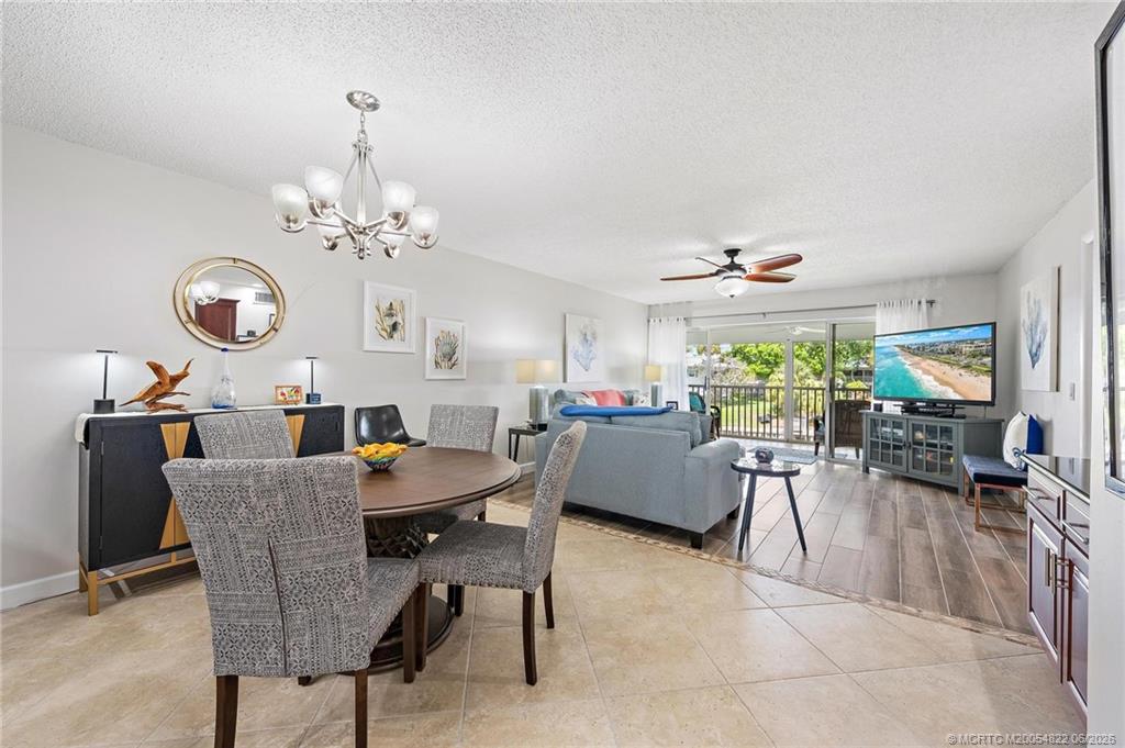 1862 Southwest Palm City Road, Unit 203 Stuart, FL 34994 - Photo 12 of 39 a view of a dining room with furniture window and outside view
