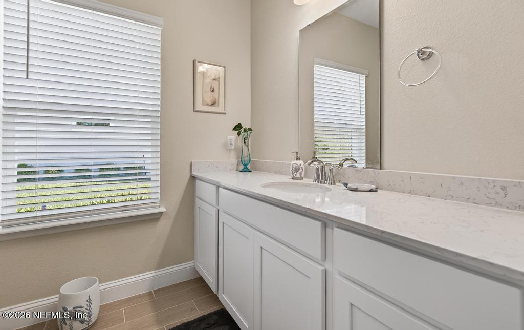 75263 Weathersford Place Yulee, FL 32097 - Photo 41 of 80 a bathroom with a sink and a window
