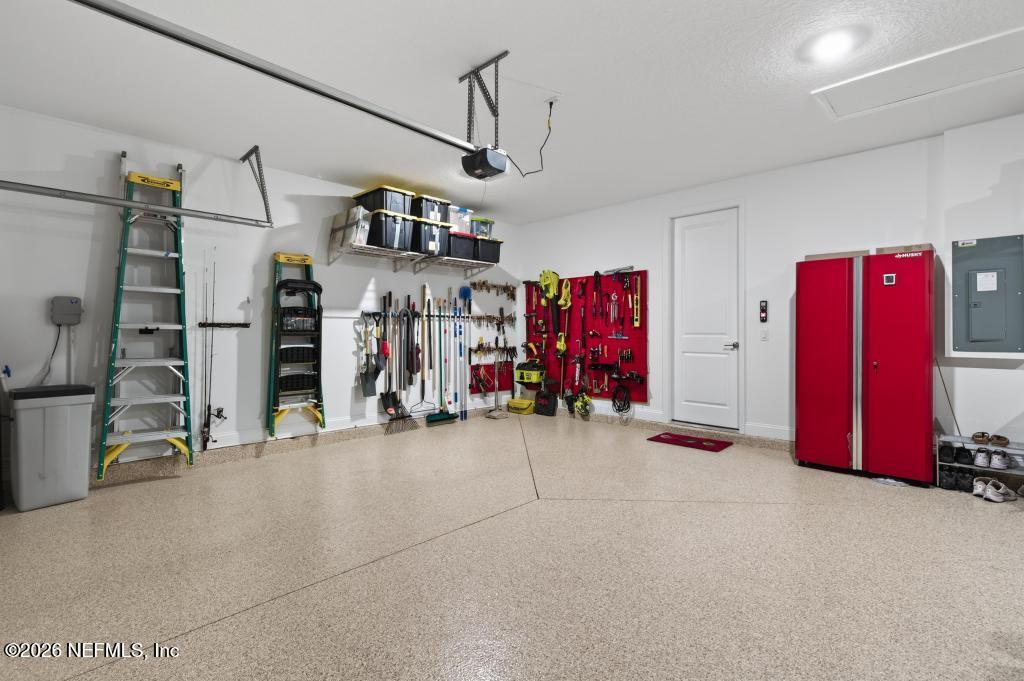 75263 Weathersford Place Yulee, FL 32097 - Photo 54 of 80 a view of a storage & utility room with clothes and shoes