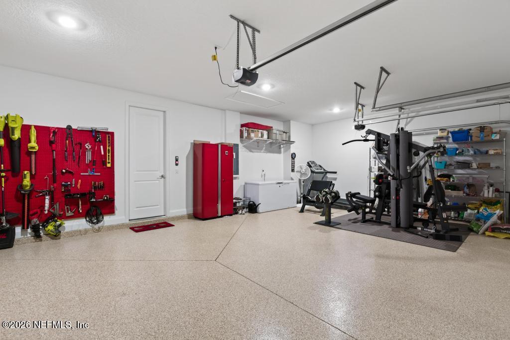 75263 Weathersford Place Yulee, FL 32097 - Photo 56 of 80 a view of a room with gym equipment