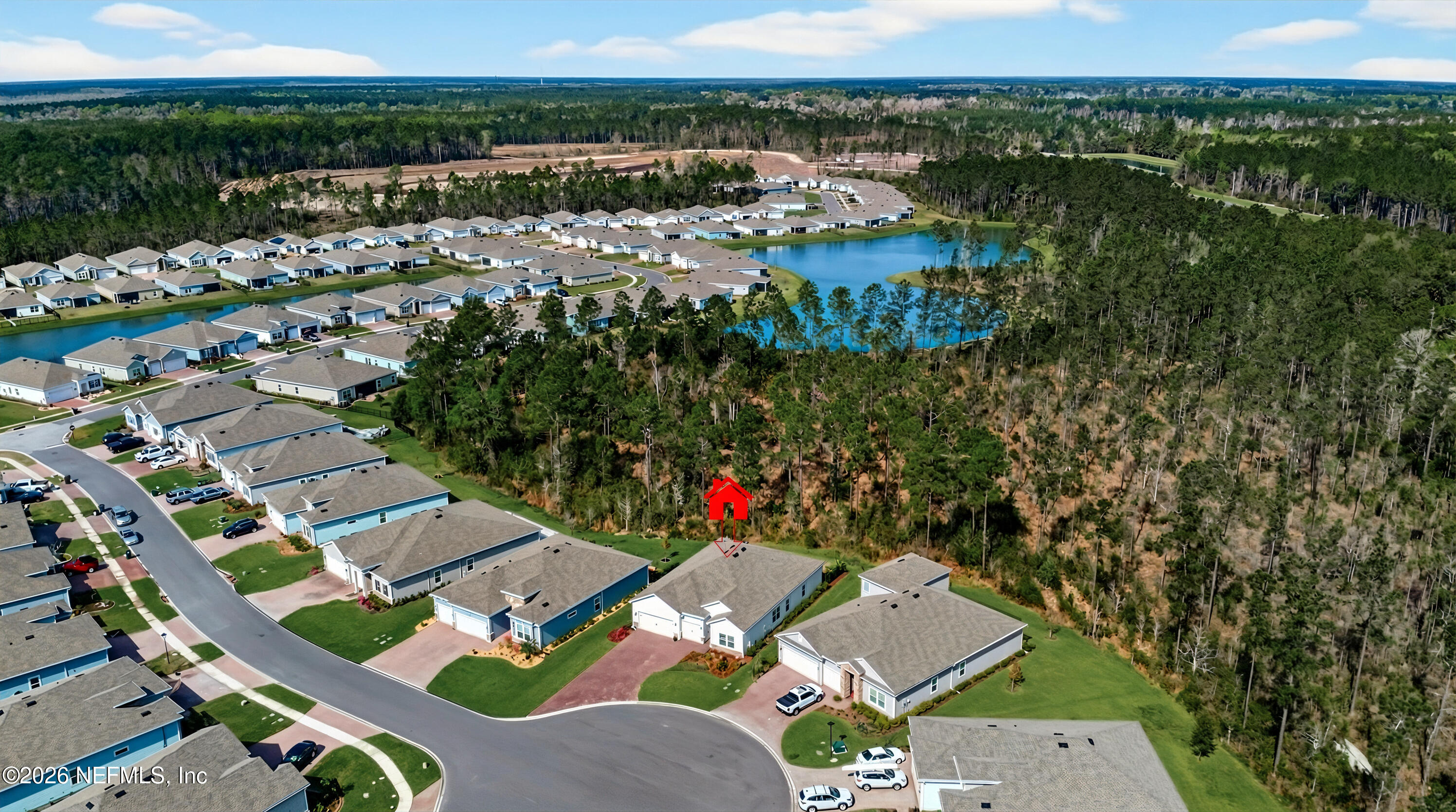 75263 Weathersford Place Yulee, FL 32097 - Photo 80 of 80 an aerial view of residential houses with outdoor space and river